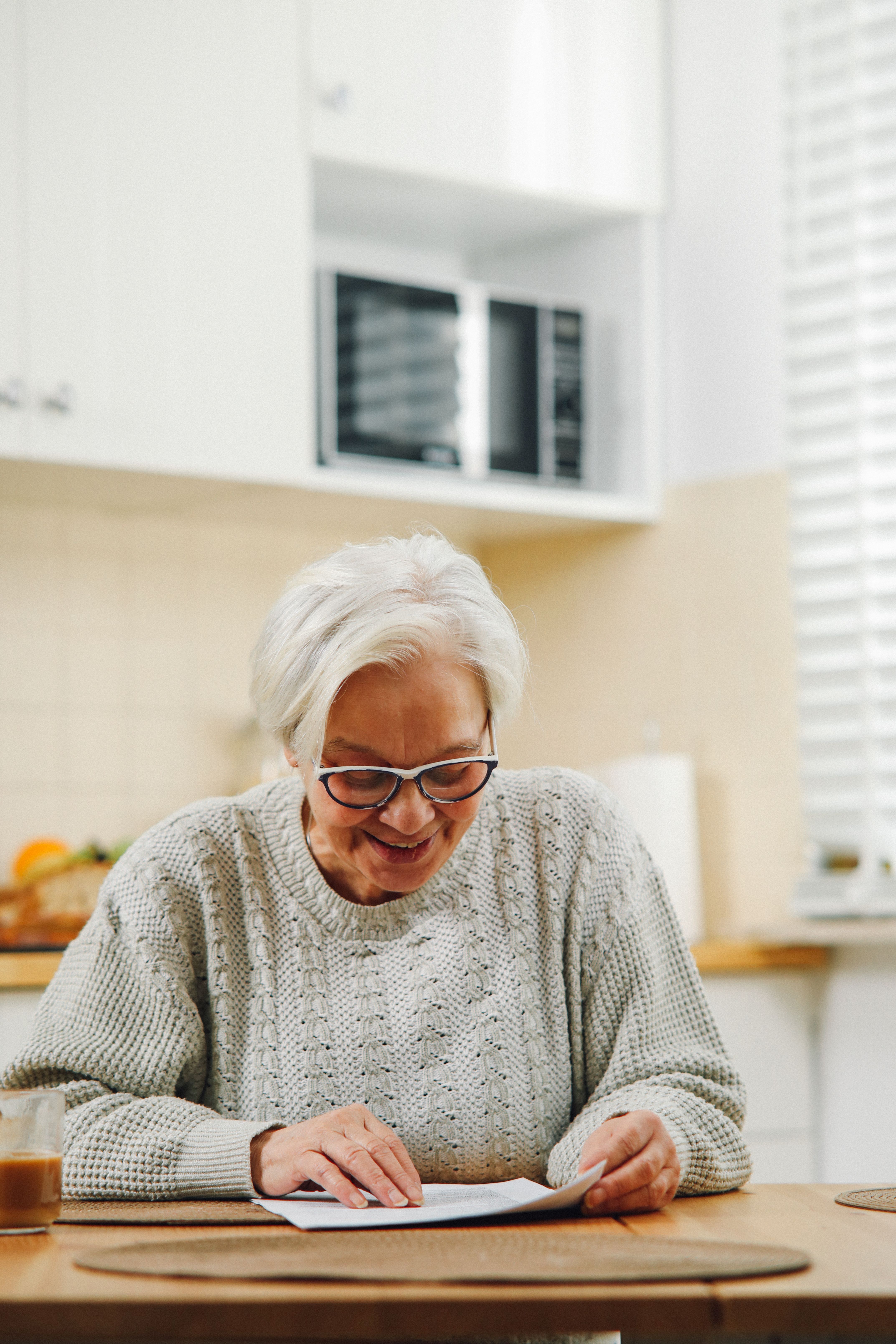 Senior woman reviewing Medicare paperwork